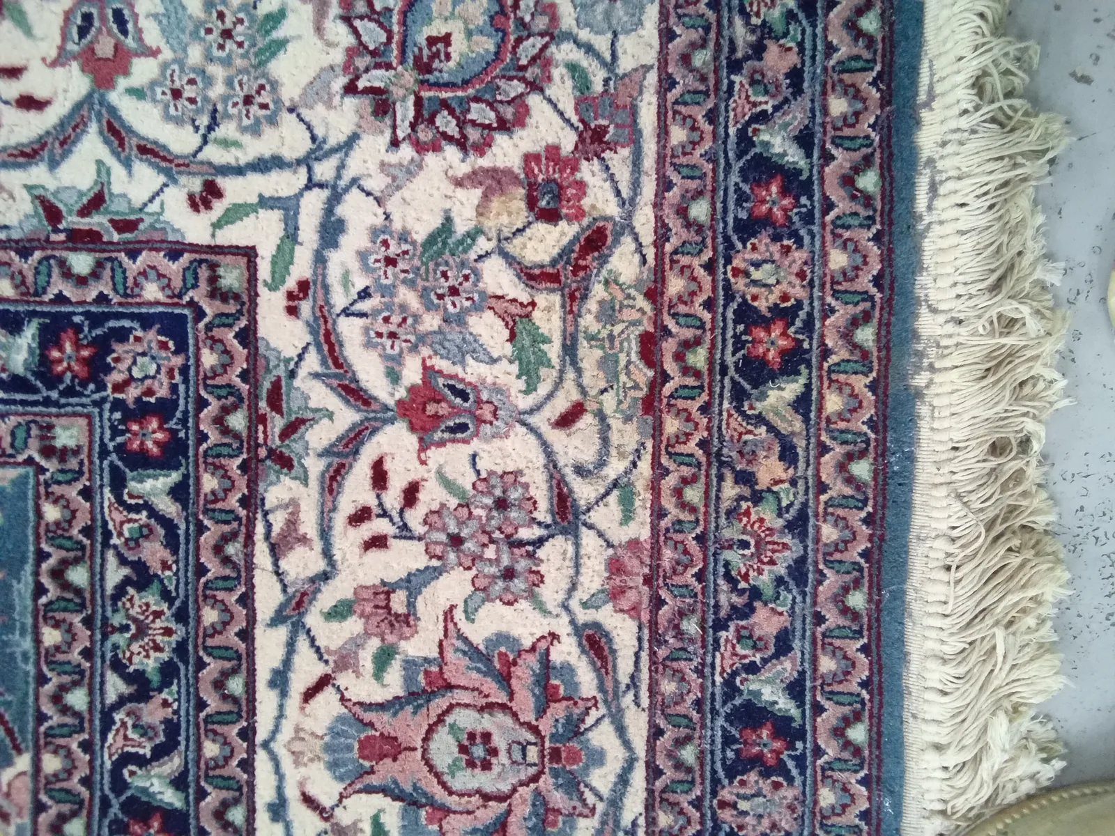 From a job in Aventura: the border and field of a blue and cream Persian rug